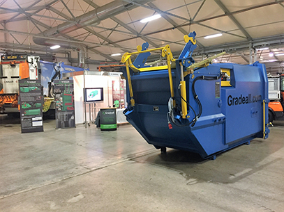 Gradeall GPC P9 wet waste compactor with bin lift