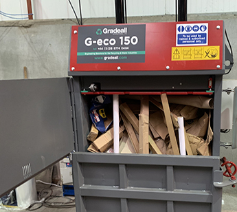 Hard cardboard tubes in Gradeall G eco 150
