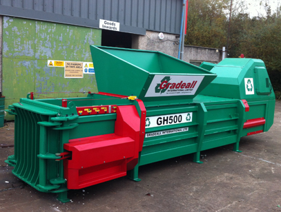 Recycle paper, cardboard or plastics using a Gradeall GH500 featuring forklift tipping skip entry.