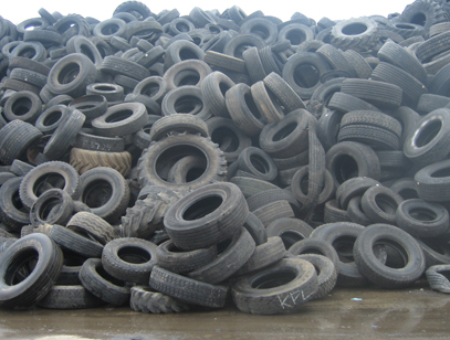 Mountain of tyres | MKII Tyre Baler | Gradeall International