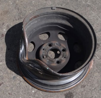 Bent tyre rim | Gradeall | Tyre Rim Separator