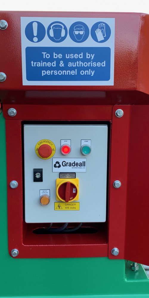 Close-up of Gradeall Car Tyre Sidewall Cutter's control panel and cutting arm.
