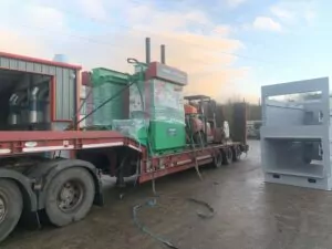 Gradeall GV500 baler for shipping on a trailer