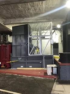 Static waste compactor, CHEM, G90, bin lift, safety cage, Gradeall, Shopping centre waste management