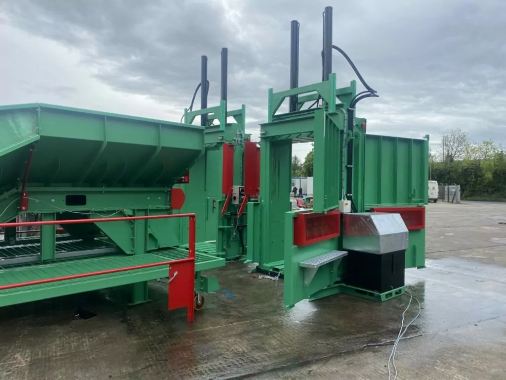 Gradeall Inclined Tyre Baler Conveyor system with a hopper and two MK2 Tyre Balers ready for operation.